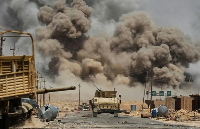 Liên quân chống IS không kích phá hủy kho đạn tại Syria ảnh 1