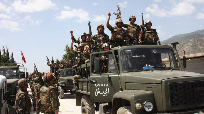 Quân đội Syria tiến vào giải phóng thủ đô trên thực tế của IS ảnh 1