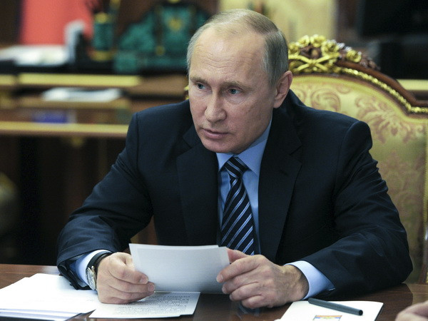 Tổng thống Nga Vladimir Putin. (Nguồn: AP/TTXVN) Tổng thống Nga sẽ gặp ông Donald Trump vào đầu năm 2017 ảnh 1