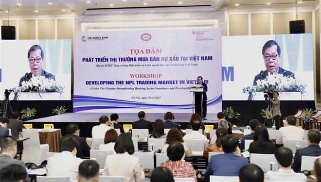 Quang cảnh tọa đàm "Phát triển thị trường mua bán nợ xấu tại Việt Nam" tại Hà Nội ngày 29/11/2022. (Ảnh: Trần Việt/TTXVN) Phó Thống đốc NHNN: Thị trường mua bán nợ tại Việt Nam còn sơ khai ảnh 1
