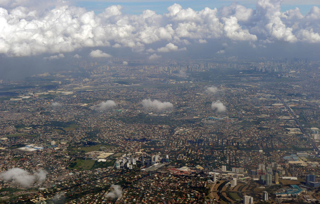 Philippines lấy lại tốc độ tăng trưởng kinh tế trong quý 4/2014 ảnh 1