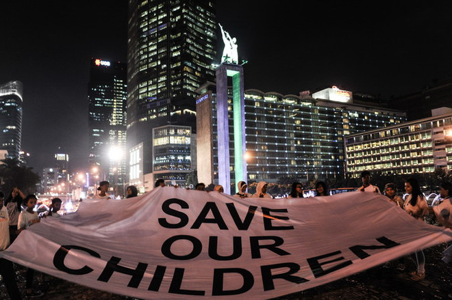 Báo động tình trạng trẻ em bị mắc kẹt trong các cuộc xung đột ảnh 1