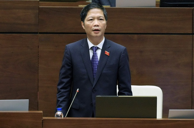 Bộ trưởng Bộ Công thương Trần Tuấn Anh trả lời chất vấn của Quốc hội, sáng 15/11. (Ảnh: Phạm Kiên/TTXVN) Đại biểu đánh giá trả lời chất vấn của Bộ trưởng Công Thương ảnh 1