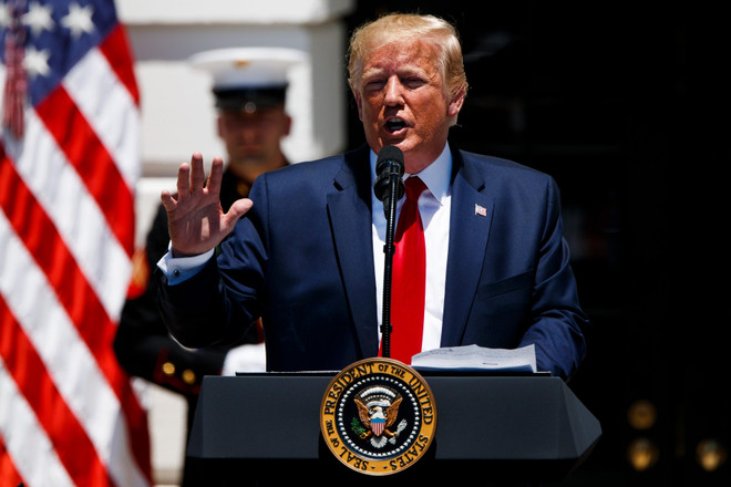 Tổng thống Mỹ bảo vệ quyết định áp thuế mới đối với hàng Trung Quốc ảnh 1