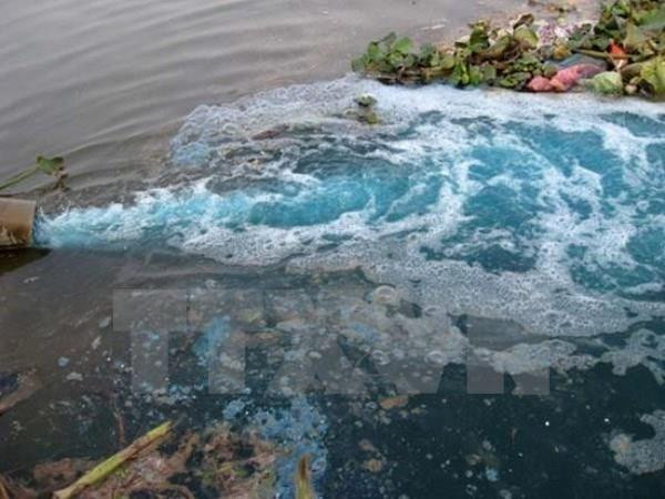 Ảnh minh họa. (Nguồn: TTXVN) Đề xuất tăng 5% phí môi trường với nước thải của cơ sở rửa ôtô, xe máy ảnh 1