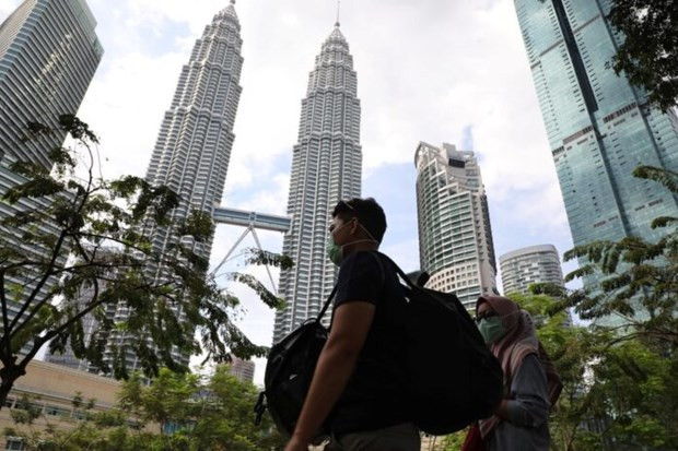 Ảnh minh họa. (Nguồn: Reuters/The Online Citizen) Ngày càng nhiều người lao động ở Malaysia lo mất việc làm ảnh 1