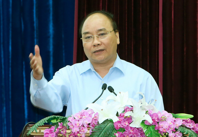 Thủ tướng Nguyễn Xuân Phúc phát biểu kết luận hội nghị. (Ảnh: Thống Nhất/TTXVN) Thủ tướng yêu cầu 5 tỉnh Tây Nguyên cải thiện môi trường đầu tư ảnh 1