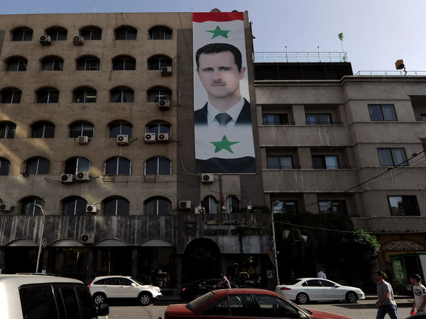 15 triệu cử tri Syria bắt đầu đi bỏ phiếu bầu cử tổng thống ảnh 1