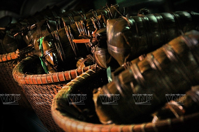 Tìm hiểu cách làm món bánh tét gia truyền của người dân Nam Bộ ảnh 9