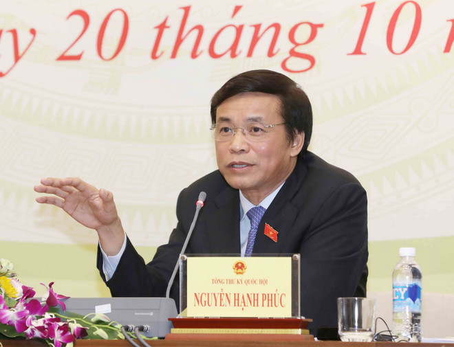 Tổng thư ký, Chủ nhiệm Văn phòng Quốc hội Nguyễn Hạnh Phúc phát biểu tại buổi họp báo. (Ảnh: Phương Hoa/TTXVN) Kỳ họp thứ 4, Quốc hội khóa XIV sẽ khai mạc vào ngày 23/10 ảnh 2