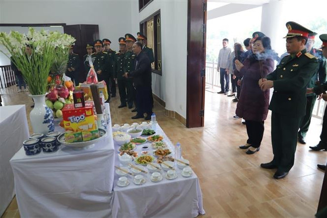 Hồi hương 10 hài cốt liệt sỹ quân tình nguyện Việt Nam tại Lào ảnh 1
