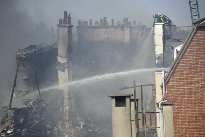 [Photo] Nổ khí gas tại tòa nhà chung cư giữa trung tâm Paris ảnh 3
