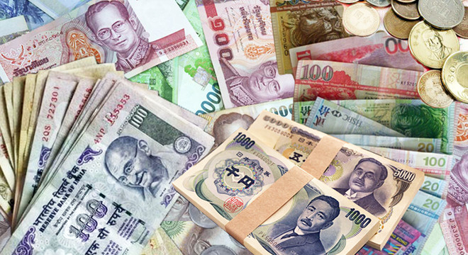 Căng thẳng thương mại Mỹ-Trung khiến đồng nội tệ nhiều nước mất giá ảnh 1