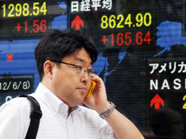 Chứng khoán châu Á đi lên trong sự lạc quan vào 2014 ảnh 1