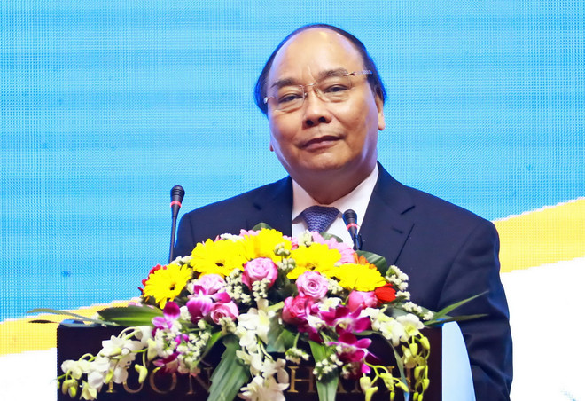 Thủ tướng Nguyễn Xuân Phúc phát biểu tại Hội nghị Xúc tiến đầu tư tỉnh Quảng Nam. (Ảnh:Thống Nhất/TTXVN) Thủ tướng Nguyễn Xuân Phúc kêu gọi các nhà đầu tư đến với Quảng Nam ảnh 1