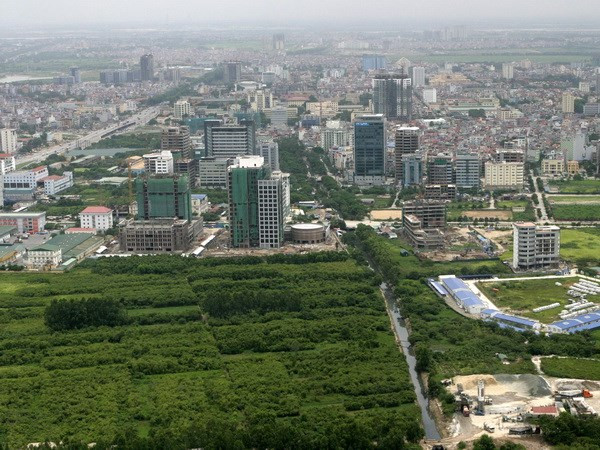 Ảnh minh họa. (Nguồn: TTXVN) Tranh cãi đánh thuế nhà: Ngân sách hụt thu, người dân chịu gánh nặng? ảnh 1