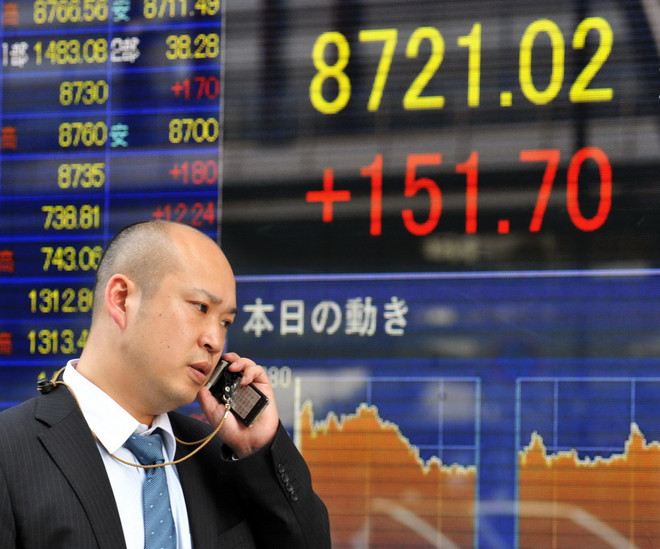 Chỉ số Nikkei “tạm biệt” năm 2014 ở mức cao nhất trong bảy năm ảnh 1