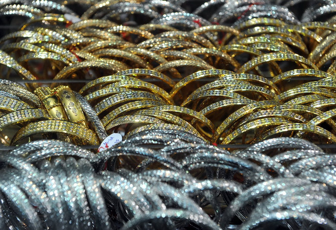 Giá vàng châu Á vẫn gần mức cao nhất trong ba tuần qua ảnh 1