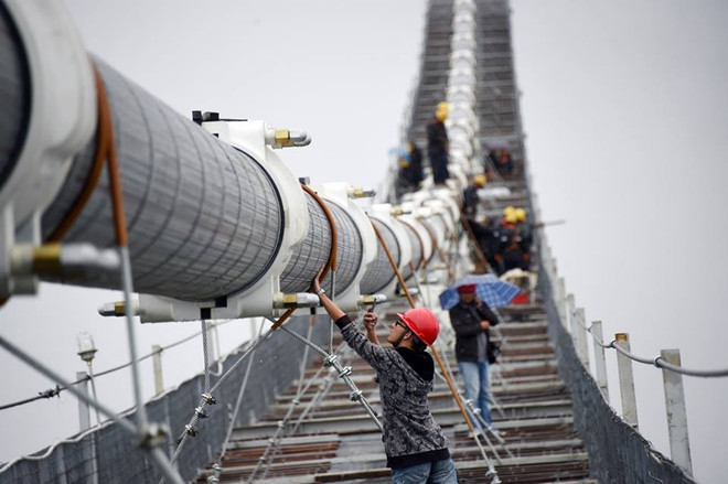 [Photo] Trung Quốc tham vọng sở hữu cầu treo lớn nhất châu Á ảnh 3