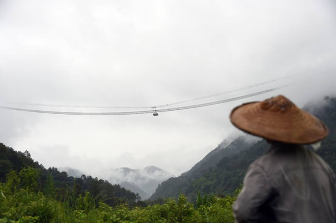 [Photo] Trung Quốc tham vọng sở hữu cầu treo lớn nhất châu Á ảnh 4