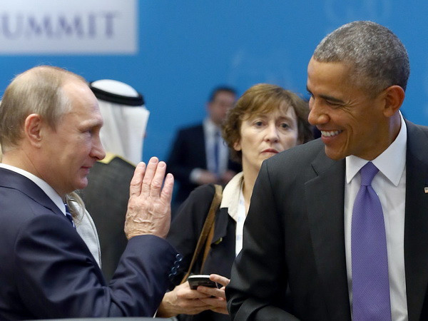 Tổng thống Nga Vladimir Putin và người đồng cấp Mỹ Barack Obama. (Nguồn: AFP/TTXVN) Nga và Mỹ lên kế hoạch thảo luận về tình hình Syria ở Peru ảnh 1