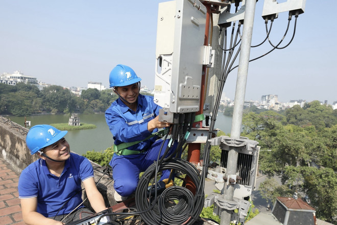 Hai tập đoàn viễn thông là Viettel và VNPT đã đấu giá thành công hai băng tần là cơ sở quan trọng để phát triển 5G tại Việt Nam. (Ảnh: Minh Quyết/TTXVN) mang 5g_vietnam.jpeg