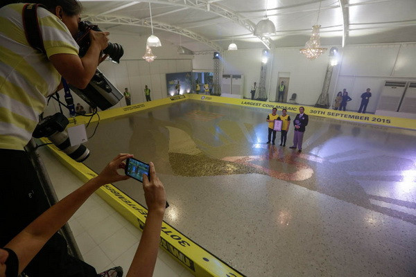 Phá vỡ kỷ lục Guinness với tấm thảm tiền xu lớn nhất thế giới ảnh 9