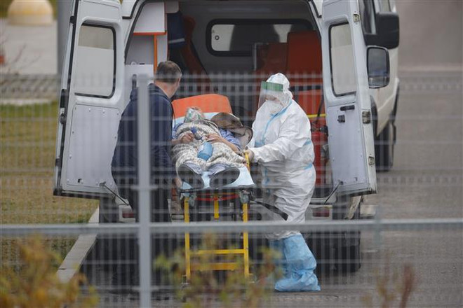 COVID-19: Số ca tử vong tại Nga vẫn cao, Lào ghi nhận nhiều ca mắc mới ảnh 1