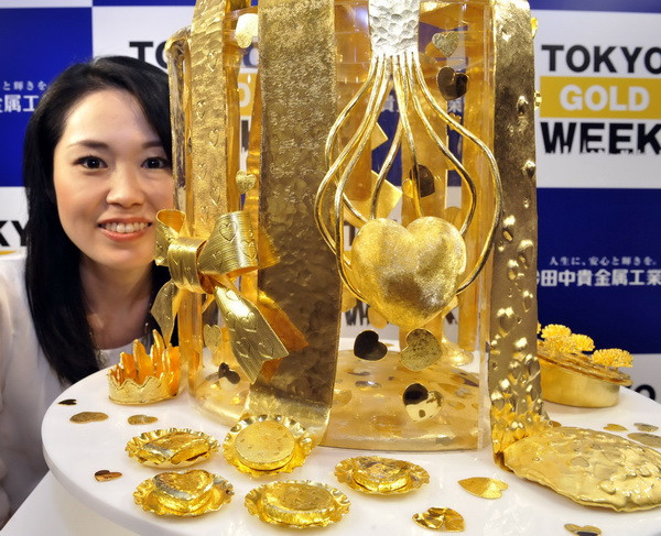 Giá vàng châu Á tiếp tục đi xuống do đồng USD tăng giá ảnh 1