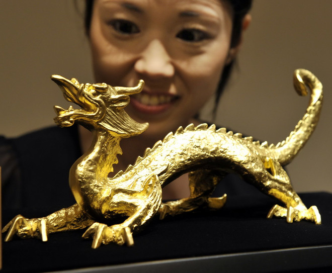 Giá vàng châu Á ghi nhận mức tăng cao nhất trong 12 tuần ảnh 1