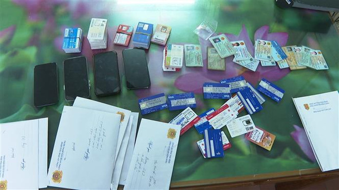 Bắt 9 đối tượng đánh bạc và mua bán thông tin tài khoản ngân hàng ảnh 2