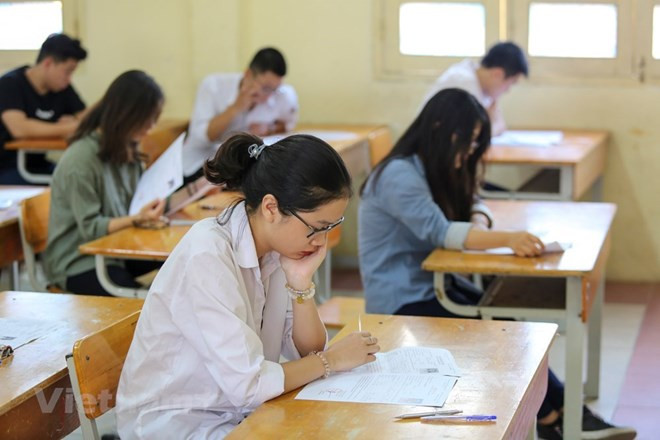 Ảnh minh họa. (Nguồn: Vietnam+) Thi THPT quốc gia 2020: Giảm độ khó trong đề thi tham khảo ảnh 2
