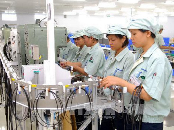 Dây chuyền sản xuất tại công ty TNHH Yokowo Vietnam (vốn đầu tư của Nhật Bản) ở khu công nghiệp Đồng Văn II, Hà Nam. (Ảnh: Danh Lam/TTXVN) Hơn 60 DN Nhật Bản tìm kiếm cơ hội đầu tư ở Hà Nam ảnh 1