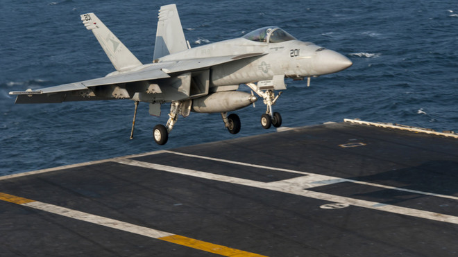 Mỹ và các đối tác triển khai hàng chục đợt không kích IS ảnh 1