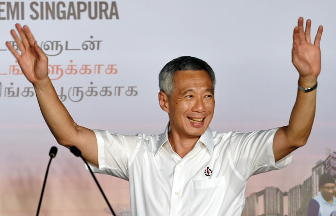 Thủ tướng điện mừng Singapore tổ chức tổng tuyển cử thành công ảnh 1