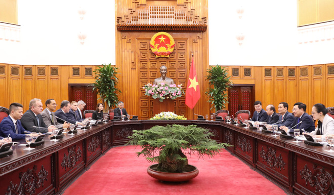 Phó Thủ tướng, Bộ trưởng Bộ Ngoại giao Phạm Bình Minh với đại diện các doanh nghiệp Hoa Kỳ. (Ảnh: Lâm Khánh/TTXVN) Phó Thủ tướng Phạm Bình Minh tiếp Đoàn doanh nghiệp Hoa Kỳ ảnh 1
