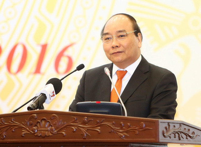 Thủ tướng Nguyễn Xuân Phúc phát biểu chỉ đạo tại hội nghị. (Ảnh: Thống Nhất/TTXVN) Thủ tướng yêu cầu "chống lợi ích nhóm" trong xây dựng pháp luật ảnh 1