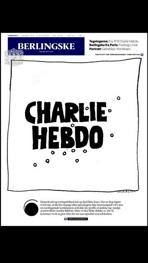 Nhiều báo thế giới đổi trang nhất sau vụ xả súng ở báo Charlie Hebdo ảnh 10