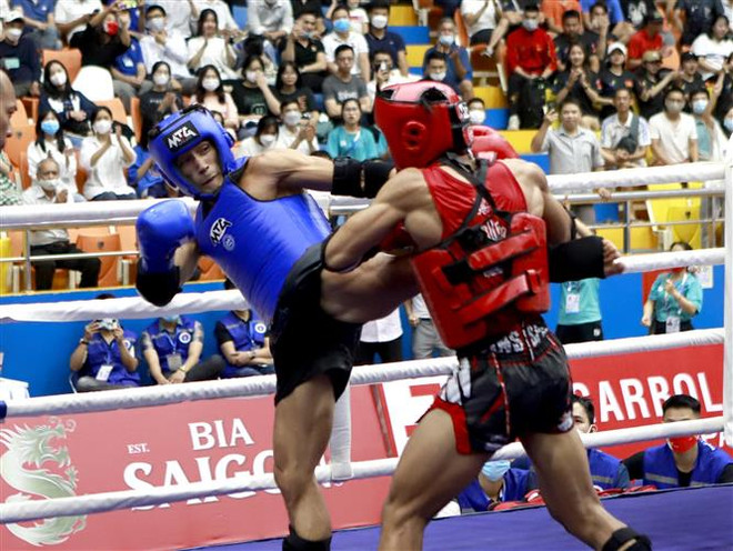 Đánh bại đối thủ Philippines, Nguyễn Trần Duy Nhất vào chung kết Muay ảnh 1