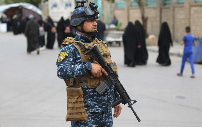 Lực lượng an ninh Iraq gác tại Baghdad. (Nguồn: AFP/TTXVN) Iraq khẳng định tình hình an ninh trong nước ổn định ảnh 1