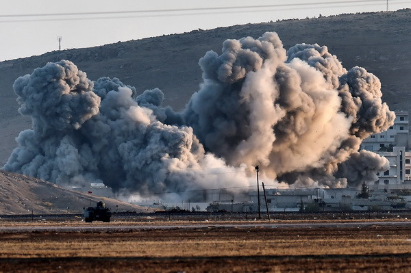 Kobane rơi vào tay Tổ chức Nhà nước Hôi giáo tự xưng. (Ảnh: AFP/TTXVN) Liên minh châu Âu kêu gọi mở rộng hợp tác quốc tế chống IS ảnh 1
