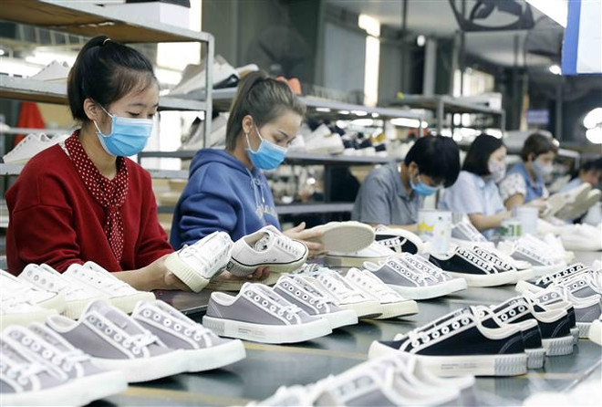 Mục tiêu xuất khẩu 20 tỷ USD của Hiệp hội Dệt may và Da giày, túi xách Việt Nam được đánh giá là khả quan. (Ảnh: Trần Việt/TTXVN) Công đoàn và ngành dệt may-da giày nỗ lực chăm lo cho người lao động ảnh 2