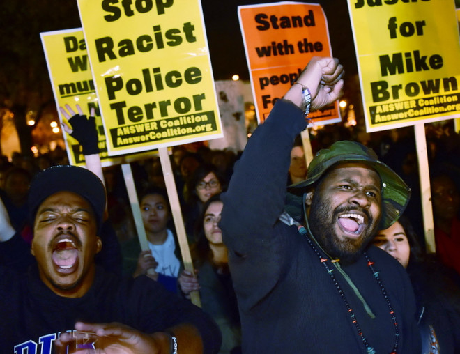 Tổng thống Mỹ Obama họp nội các về vụ việc ở Ferguson ảnh 1