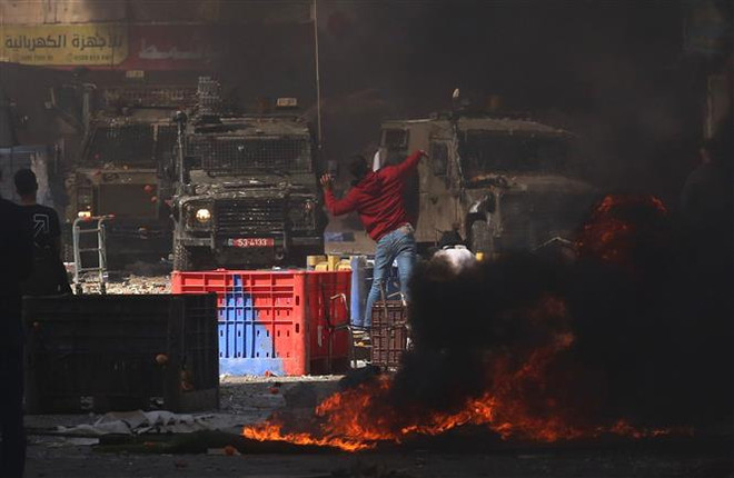 Hội đồng Bảo an Liên hợp quốc họp khẩn về tình hình bạo lực ở Bờ Tây ảnh 1