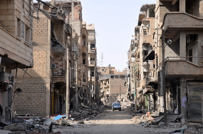 Tổ chức khủng bố IS tái chiếm gần nửa thành phố Albu Kamal của Syria ảnh 1