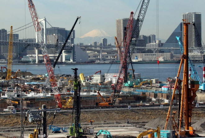 Nhật Bản điều chỉnh giảm số liệu tăng GDP quý 4 năm 2014 ảnh 1