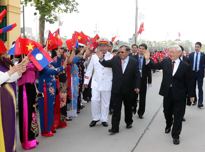 Tổng Bí thư, Chủ tịch nước Lào gửi điện cảm ơn lãnh đạo Việt Nam ảnh 1