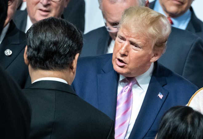 Tổng thống Mỹ Donald Trump và Chủ tịch Trung Quốc Tập Cận Bình tại hội nghị G20. (Nguồn: Getty Images) Ông Trump: Dừng đánh thuế mới với Trung Quốc, cho Huawei mua hàng Mỹ ảnh 1