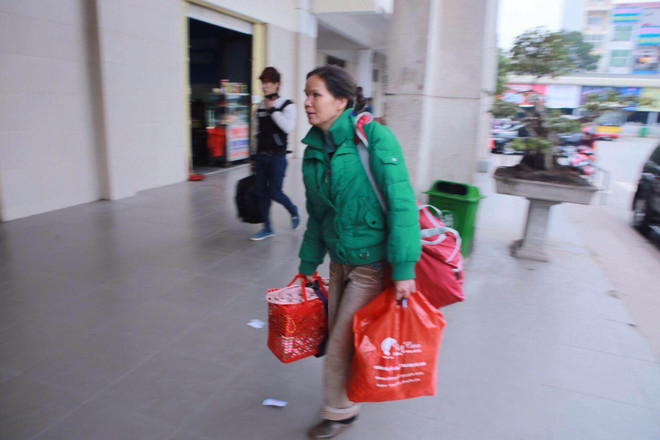 Người dân chen chân nhau rời Thủ đô Hà Nội về quê ăn Tết ảnh 8