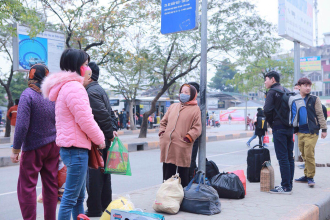 Người dân chen chân nhau rời Thủ đô Hà Nội về quê ăn Tết ảnh 7